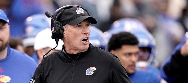 Kansas head coach Lance Leipold watches during the first half of an NCAA college football game against Oklahoma Saturday, Oct. 23, 2021, in Lawrence, Kan. (AP Photo/Charlie Riedel)
