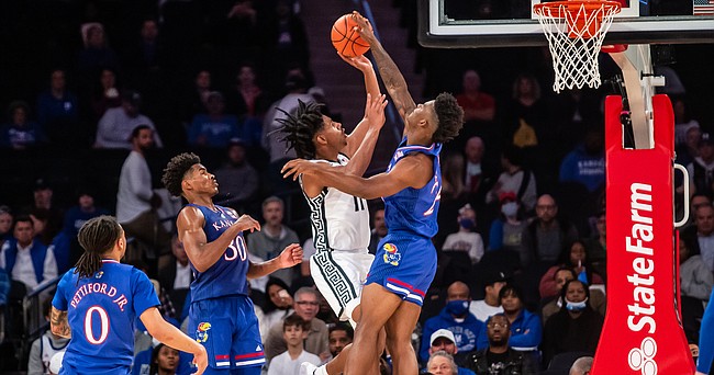 Kansas forward KJ Adams Jr. rejects a shot by Michigan State's AJ Hoggard as time expires in the first half of the Jayhawks' 87-74 win over the Spartans on Tuesday, Nov. 9, 2021 at Madison Square Garden in New York City. 