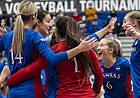 Members of the Kansas volleyball team come together during the Jayhawks' Sweet 16 match at Pitt, on Dec. 9, 2021, in Pittsburgh, Pennsylvania.