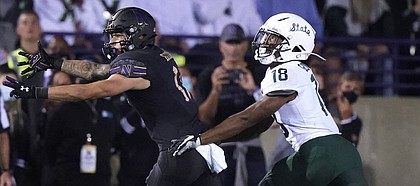 In this AP file photo, Northwestern wide receiver Bryce Kirtz, left, reaches in vain for a pass as Michigan State cornerback Kalon Gervin defends during the first half of an NCAA college football game in Evanston, Ill., Friday, Sept. 3, 2021. Gervin announced on Dec. 10, 2021, he plans to transfer to Kansas. (AP Photo/Nam Y. Huh)
