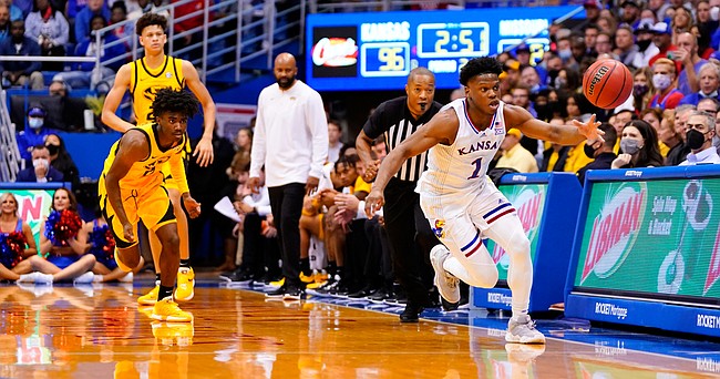 Kansas guard Joseph Yesufu (1) chases down a steal from Missouri guard Anton Brookshire (0) during the second half on Saturday, Dec. 11, 2021, at Allen Fieldhouse.