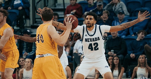 Nevada forward K.J. Hymes defends the ball during a recent Wolf Pack victory over Minnesota-Duluth. 