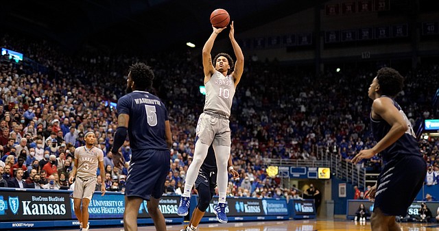 Kansas forward Jalen Wilson (10) pulls up for a jumper against Nevada during the second half on Wednesday, Dec. 29, 2021 at Allen Fieldhouse.