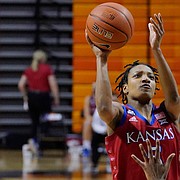 Kansas guard Aniya Thomas (5) shoots in front of Oklahoma State forward Natasha Mack (4) in the first half of an NCAA college basketball game Tuesday, Feb. 2, 2021, in Stillwater, Okla.