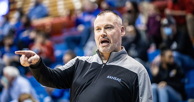 Kansas women's basketball coach Brandon Schneider during a game against Oklahoma State at Allen Fieldhouse in Lawrence.