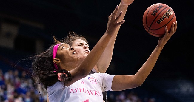 Kansas women's basketball center Taiyanna Jackson tries to shoot during the game against Iowa State at Allen Fieldhouse on Feb. 23, 2022.