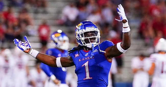 Kansas safety Kenny Logan Jr. (1) pulls the crowd onto their feet during the third quarter on Friday, Sept. 3, 2021 at Memorial Stadium. (Photo by Nick Krug/Special to the Journal-World)