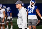 Kansas coach Lance Leipold observes his team practice at the indoor practice facility on Tuesday, March 1, 2022.
