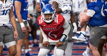 Kansas junior quarterback Jalon Daniels during spring practice at the indoor practice facility on Tuesday, March 1, 2022.