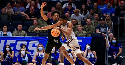 Texas A&M-Corpus Christi's Simeon Fryer, back, defends against Texas Southern's AJ Lawson during the first half of a First Four game in the NCAA men's college basketball tournament Tuesday, March 15, 2022, in Dayton, Ohio. (AP Photo/Aaron Doster)


