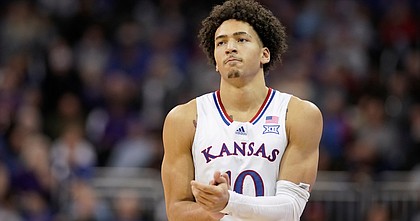 Kansas forward Jalen Wilson (10) claps his hands after a turnover by West Virginia during the first half on Thursday, March 10, 2022 at T-Mobile Center in Kansas City.