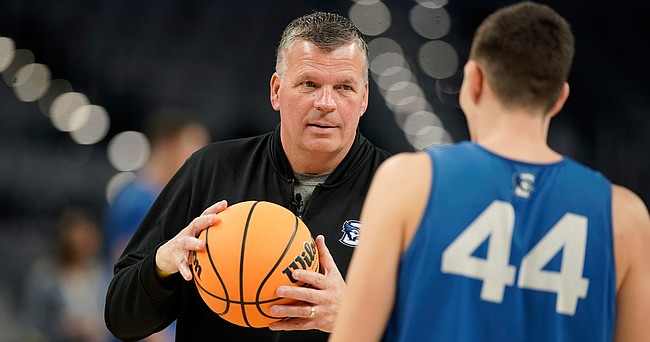Creighton head coach Greg McDermott talks with Creighton forward Ryan Hawkins (44) during the Bluejays' practice on Wednesday, March 16, 2022 at Dickies Arena in Fort Worth, Texas.