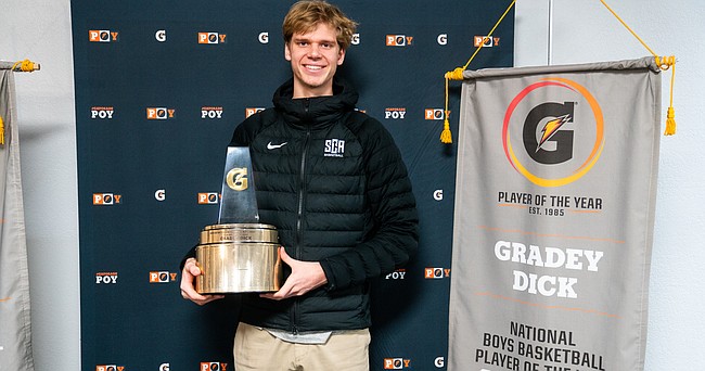 Kansas basketball signee Gradey Dick poses with his Gatorade National Boys Basketball Player of the Year trophy on Tuesday, March 22, 2022 at Sunrise Christian Academy in Wichita. 
