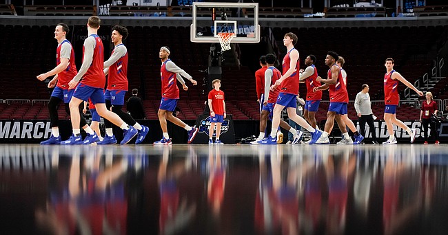 Kansas players get warmed up at the start of practice on Thursday, March 24, 2022 at United Center in Chicago.