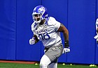 Kansas defensive tackle Caleb Sampson completes a drill during spring practice on March 22, 2022.
