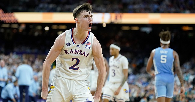 Kansas guard Christian Braun (2) goes berserk after getting a breakaway bucket against North Carolina during the second half of the NCAA National Championship game on Monday, April 4, 2022 at Caesars Superdome in New Orleans.