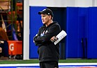 Kansas football coach Lance Leipold observes a practice at the indoor football fields on March 29, 2022.