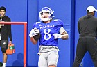 Kansas running back Ky Thomas participates in a drill at the indoor practice facility on March 29, 2022.