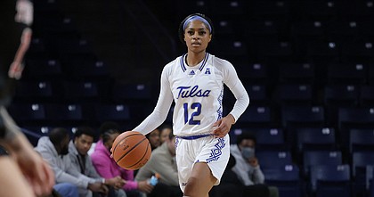 Tulsa guard Wyvette Mayberry takes the ball up the court during a game against Temple at Reynolds Center on Feb. 12, 2022.