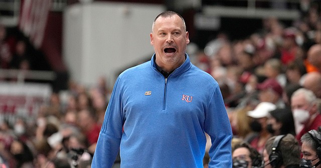 Kansas head coach Brandon Schneider yells to his bench during the first half of a second-round game against Stanford in the NCAA tournament on March 20, 2022, in Stanford, Calif.