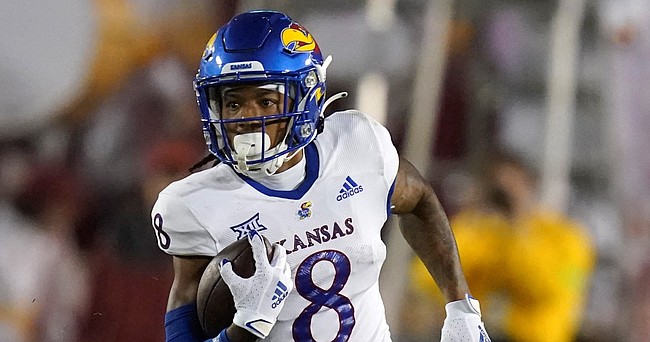 Kansas wide receiver Kwamie Lassiter II runs upfield during the second half of a college football game against Iowa State on Oct. 2, 2021, in Ames, Iowa.