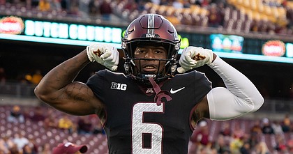 Former Minnesota wide receiver Douglas Emilien shows off prior to a game against Ohio State at Huntington Bank Stadium on Sept. 2, 2021.