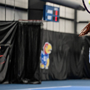 Kansas senior Malkia Ngounoue stretches for a ball during an indoor match earlier this year. Ngounoue is one of four seniors on this year's roster that helped the Jayhawks return to the NCAA Tournament for the first time since 2019. 