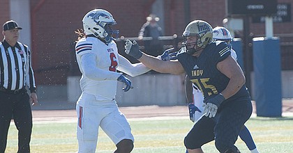 Hutchinson Community College defensive end Davion Westmoreland, left, tries to get by Independence Community College left tackle Thomas Le Boucher during a game at Shulties Stadium in Independence on Nov. 14, 2021.