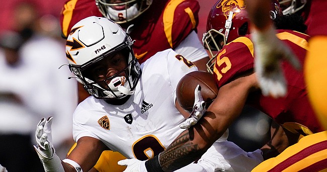 Arizona State wide receiver LV Bunkley-Shelton is tackled by USC safety Talanoa Hufanga during a game on Nov. 7, 2020, in Los Angeles.