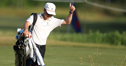 Kansas senior Ben Sigel gives a thumbs up between shots during the opening round of the Texas A&M regional on Monday, May 16, 2022 at The Traditions Golf Club in Bryan, Texas. 
