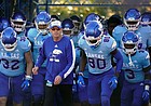 Kansas head coach Lance Leipold runs onto the field with his team prior to a college football game against Texas Tech on Oct. 16, 2021, in Lawrence.