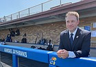 Dan Fitzgerald hangs out in the KU dugout at Hoglund Ballpark shortly after being introduced as KU's next head baseball coach on Thursday, June 16, 2022. 