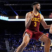UCLA guard Jaime Jaquez Jr., right, tries to get by USC forward Isaiah Mobley during a game on March 5, 2022, in Los Angeles. UCLA and USC are leaving the Pac-12 for the Big Ten in a seismic change that could lead to another major realignment of college sports.