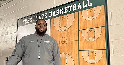 Kansas great Sherron Collins, now the boys basketball coach at Free State High, poses for a portrait on June 22, 2022, at Free State High School.