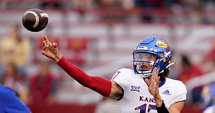 Kansas quarterback Jason Bean warms up before a game against Iowa State on Oct. 2, 2021, in Ames, Iowa.