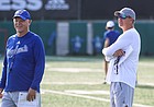 Kansas coach Lance Leipold, right, and defensive coordinator Brian Borland share a laugh during the first day of practice on Tuesday, Aug. 2, 2022.