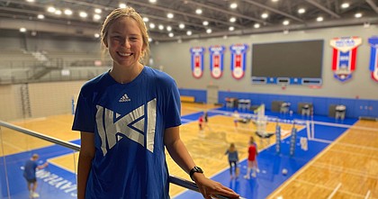 Kansas volleyball senior Rachel Langs, shown here before a recent practice at Horejsi Family Volleyball Arena, is back with the program for her fifth season. 