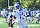 Kansas linebacker Craig Young goes through a drill during training camp practice on Aug. 10, 2022.