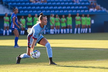 Kansas senior goal keeper Melania Pasar rolls the ball to a teammate against Ohio State on Thursday, Aug. 18, 2022 at Rock Chalk Park.
