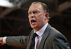 East Carolina head coach Joe Dooley protests a call during the first half of an NCAA college basketball game against Houston in Greenville, N.C., Wednesday, Jan. 29, 2020. (AP Photo/Karl B DeBlaker)