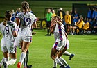 The Kansas women's soccer team celebrates a second-half goal by Shira Elinav in the Jayhawks' 1-0 win at Iowa on Thursday, Aug. 25, 2022. 