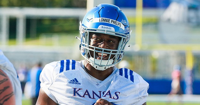 Kansas defensive end Lonnie Phelps Jr. during practice at David Booth Memorial Stadium on Aug. 20, 2022. Phelps will be coached by Taiwo Onatolu, who was promoted to defensive ends coach in November as part of a staff overhaul.