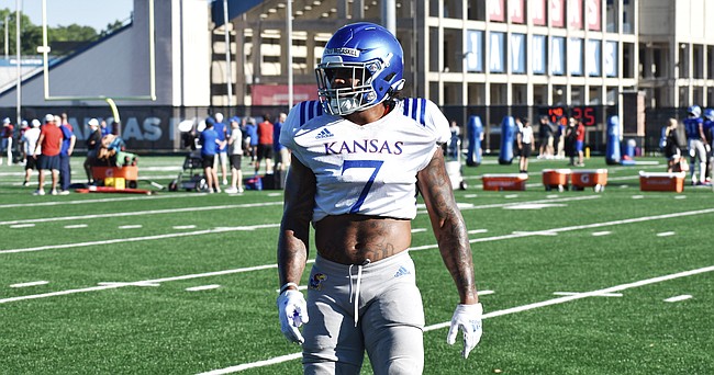 Kansas linebacker Lorenzo McCaskill recovers from a drill during a training camp practice on Aug. 10, 2022.