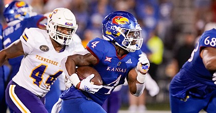 Kansas running back Devin Neal takes off on a long touchdown run against Tennessee Tech during the third quarter on Friday, Sept. 2, 2022, at Memorial Stadium.