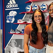 Former Kansas volleyball All-Americans Ainise Havili, left, and Kelsie Payne, returned to Lawrence this weekend to become the first players in program history have their jerseys retired. 