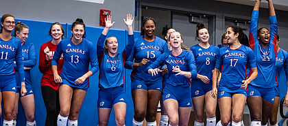 Members of the Kansas volleyball team celebrate the Jayhawks' three-set sweep of Lipscomb on Thursday, Sept. 15, 2022, at Horejsi Family Volleyball Arena. 