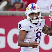 Kansas running back Torry Locklin (12) celebrates after his touchdown with Ky Thomas during the first half of an NCAA college football game against Houston, Saturday, Sept. 17, 2022, in Houston. (AP Photo/Eric Christian Smith)


