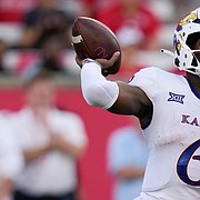Kansas quarterback Jalon Daniels looks to throw a pass during a game against Houston on Sept. 17, 2022, in Houston.