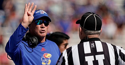 Kansas football coach Lance Leipold makes a point to an official during KU's home game against Duke on Saturday, Sept. 24, 2022 at David Booth Kansas Memorial Stadium. (AP Photo/Charlie Riedel)