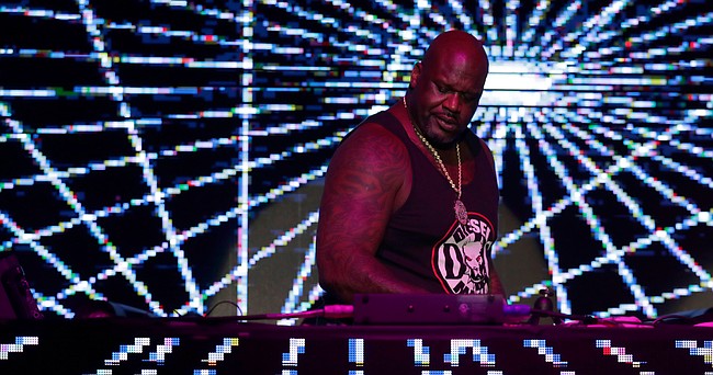Former NBA basketball player Shaquille O' Neal DJ's at Shaq's Fun House, Saturday, Feb. 1, 2020, in Miami. This carnival themed music festival is one of numerous events taking place in advance of Miami hosting Super Bowl LIV on Feb. 2. (AP Photo/Lynne Sladky)


